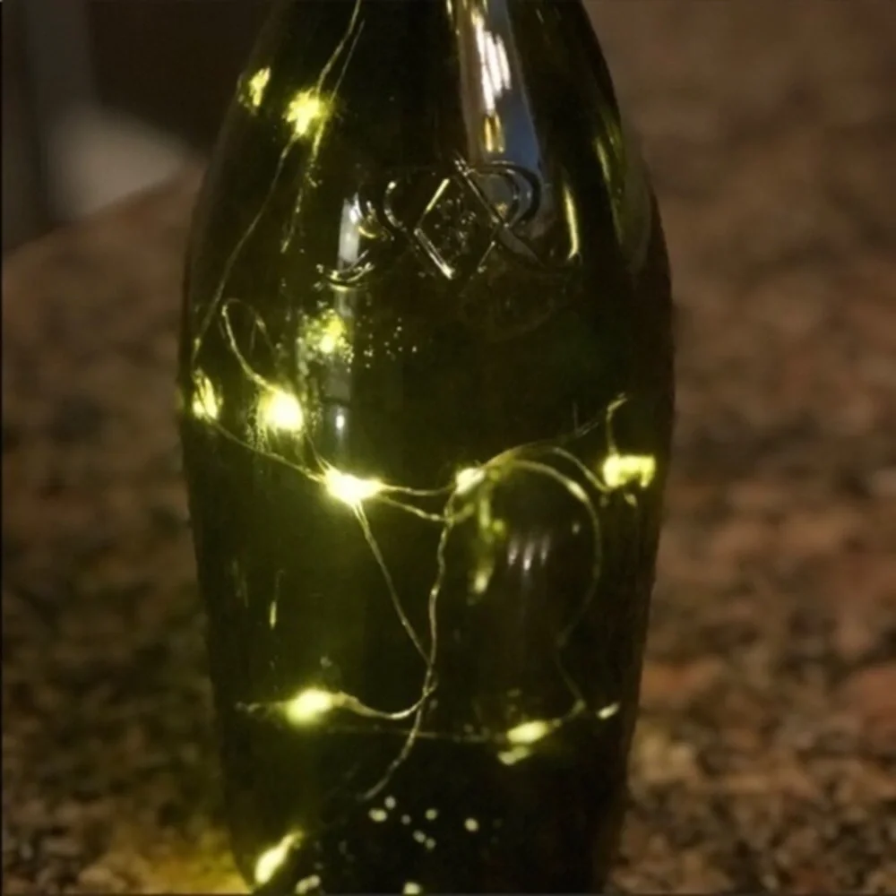 Fairy lights in wine bottle